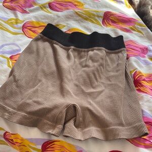 Free People Movement running shorts.